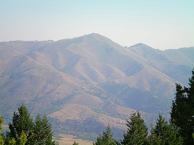 Taylor Mountain (center) as viewed from Peak 6796 to its southwest on a very smoke-hazy morning. Livingston Douglas Photo