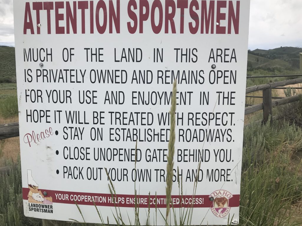 Signage at the gate. Please sign in and follow the rules.