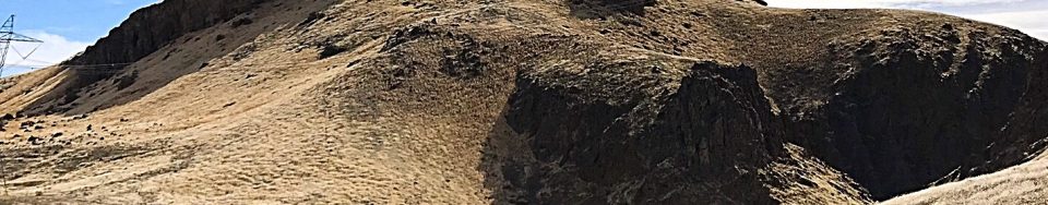 Hardtrigger Peak viewed from the north. The opening of Hard trigger Canyon is the dark area on the right side of the photo.