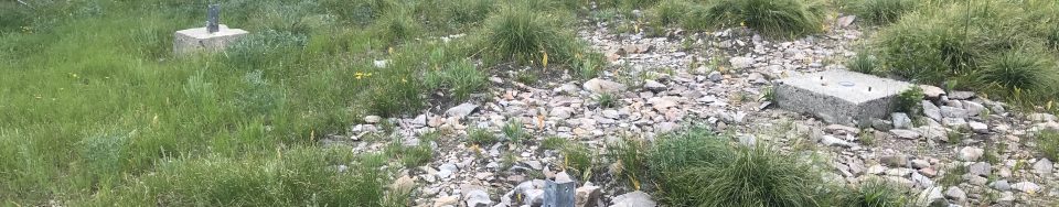The footings for the lookout tower are all that remains on the summit.