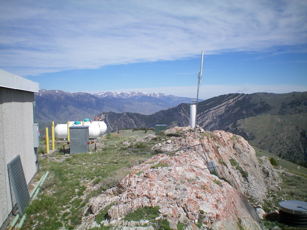 The massive summit block atop Howe Peak with the antenna installation planted firmly in it. Livingston Douglas Photo