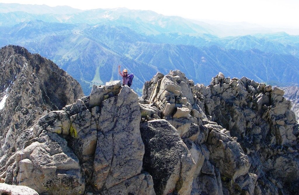 On the descent I reversed the traverse; I could have gone directly up over the little tower in front of me (also YDS Class 4 as a minimum). Behind my back is the ridge we crossed - not difficult, just big drop offs on either side. We stayed close to the crest, sometimes moving a bit to the N side. Judi Steciak Photo