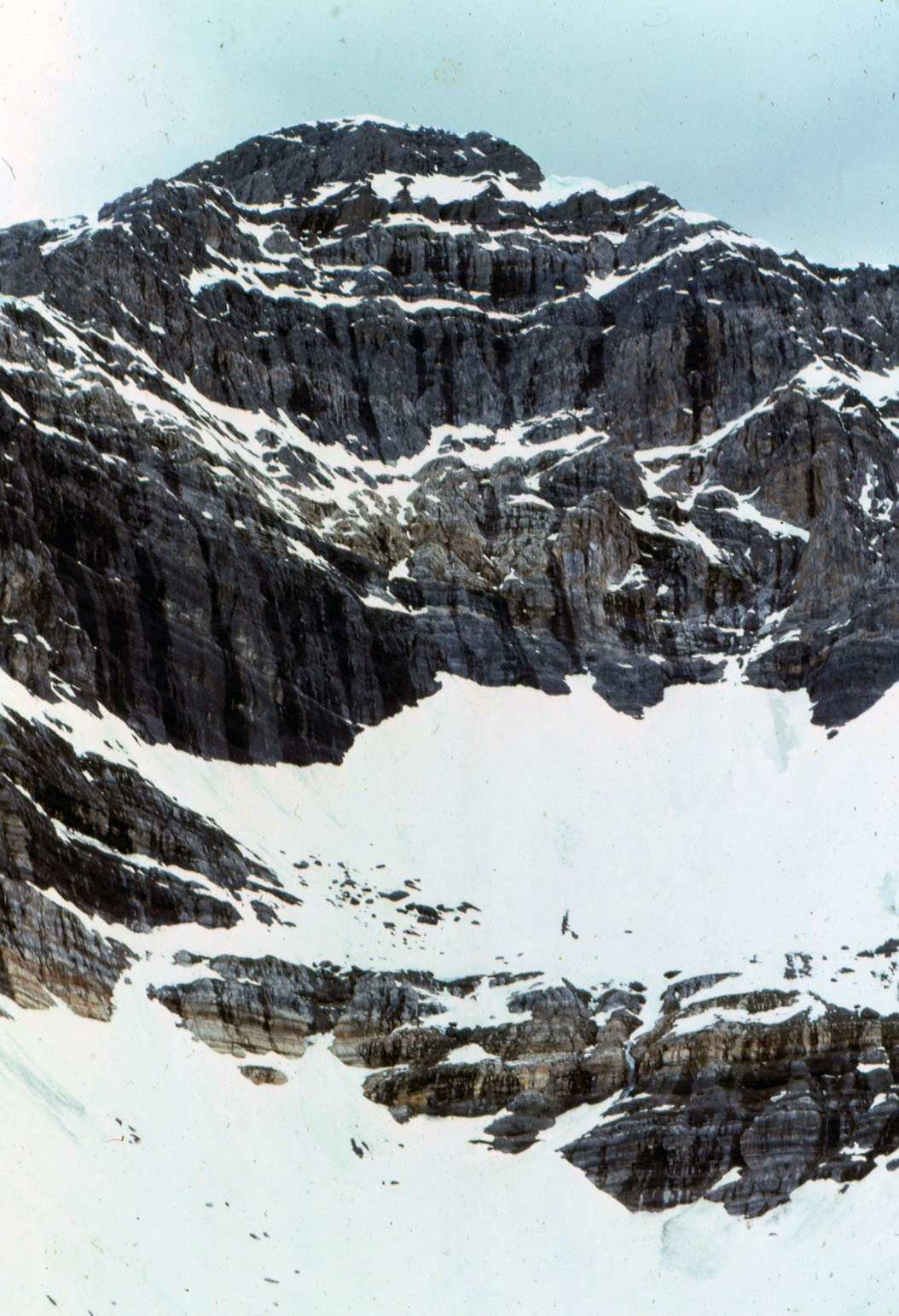 If you look closely, you can see the old blue ice showing in places. Under the snow, the ice appeared to be over 50-feet thick. The East Face of Mount Borah – June 1974. Photo by Bob Boyles
