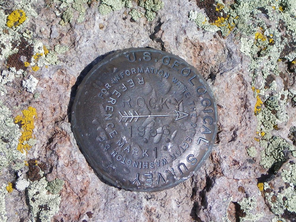 The “Rocky” USGS Benchmark atop Wedge Butte. 2 other BMs are nearby. Livingston Douglas Photo