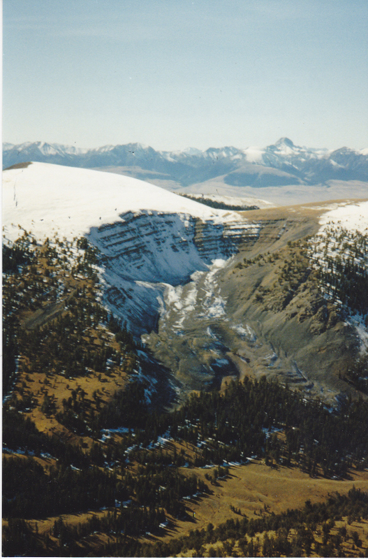 A rather uncommon sight in the southern Beaverhead Range is this evidence of classic U-shaped glaciation found on the north side of Eidelman Peak. This shot was taken from Peak 10404 (Dianes Mountain) on the Idaho/Montana Continental Divide. Rick Baugher Photo and Commentary.