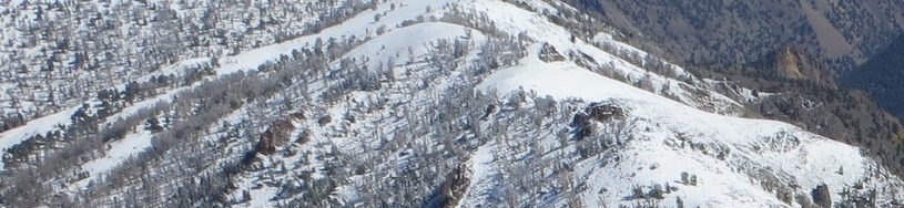 Summit of Little Kane Peak, mid-ground left. Photo - Steve Mandella.