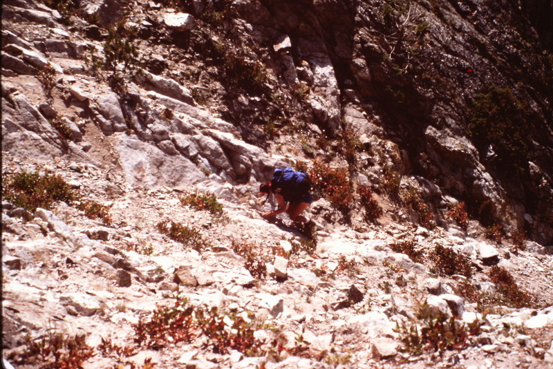 The ascent to the top of the peak's southeast ridge crosses a steep talus littered slope.