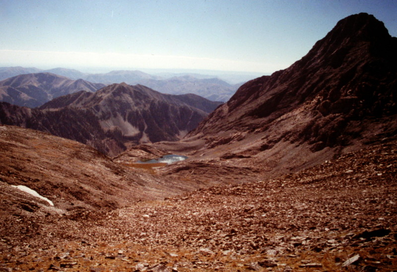 The standard route climbs into this high basin which is a sea of talus and broken rock. Cobb Peak is on the right. Big Basin Peak is out of the photo to the left and Old Hyndman is off the photo to the right.