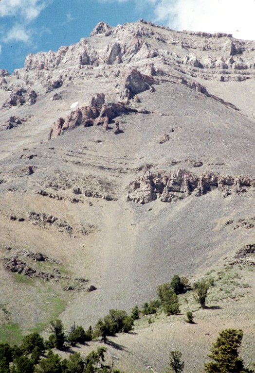 The route up West Italian Peak starts in the saddle at the bottom of this photo and then arcs up on the right side. The worst talus I ever climbed.