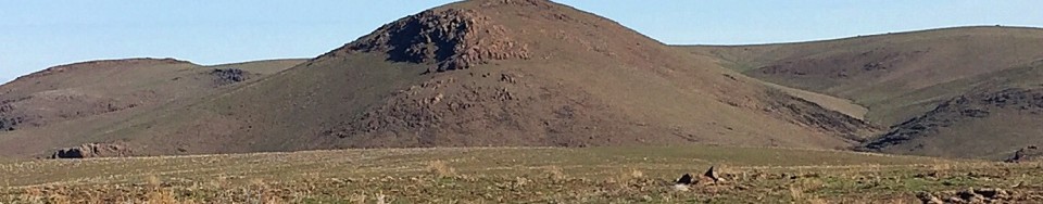 CBI Benchmark from the south. The upper Jump Creek drainage is at the base of the peak.