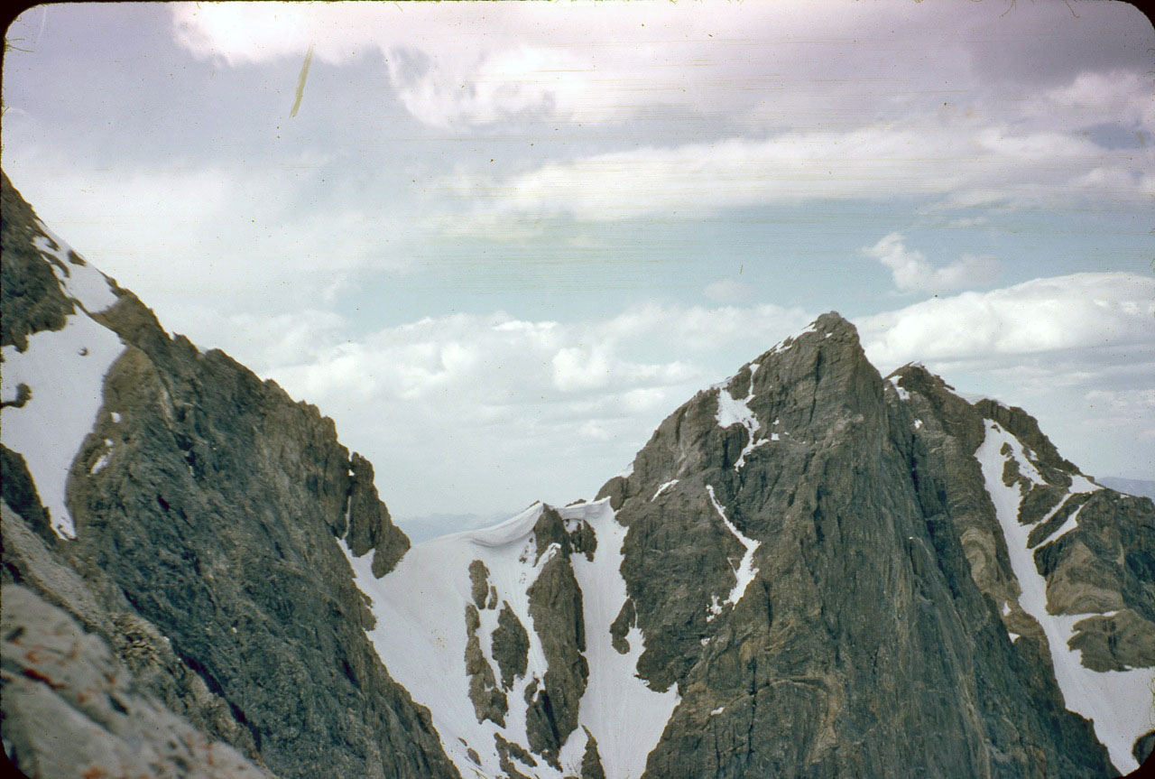 Looking across the East Face (left-to-right) at the Northeast ridge, the col and what we call the "Super Buttress." Photo - Lyman Dye