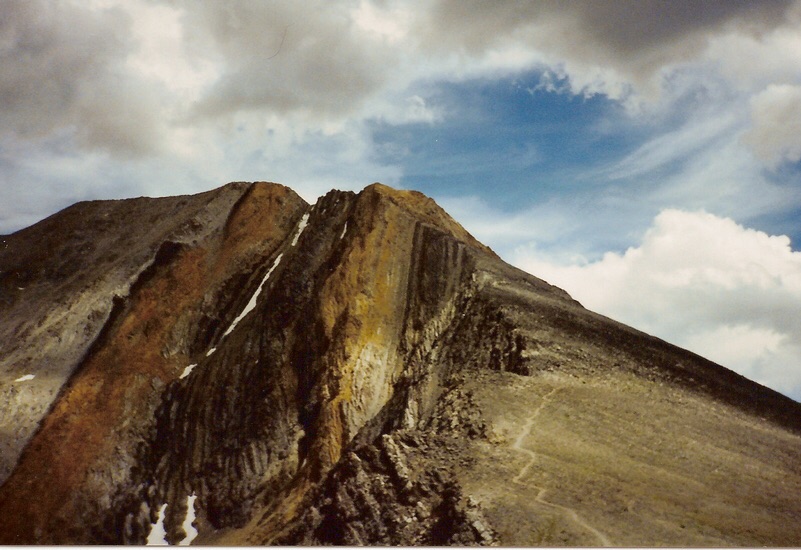 A view of the southwest ridge, the climbers' trail, and the colorful Chicken Out Ridge section. Photo - Dave Pahlas